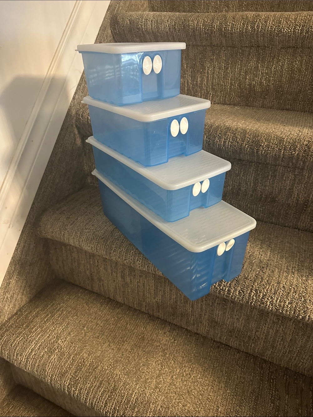 blue Tupperware FridgeSmart produce storage containers with white vented lids